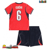 Camisa de Futebol Inglaterra Marc Guehi #6 Equipamento Secundário Infantil Mundo 2026 Manga Curta (+ Calças curtas)